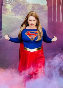 Super Gal Posing on Bridge