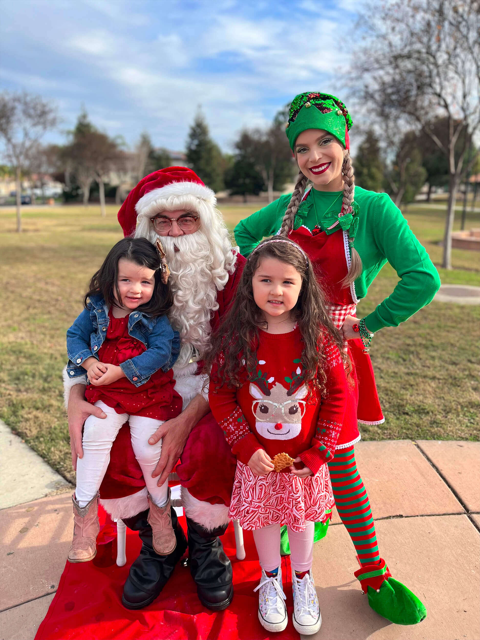 Santa with Elf and kids