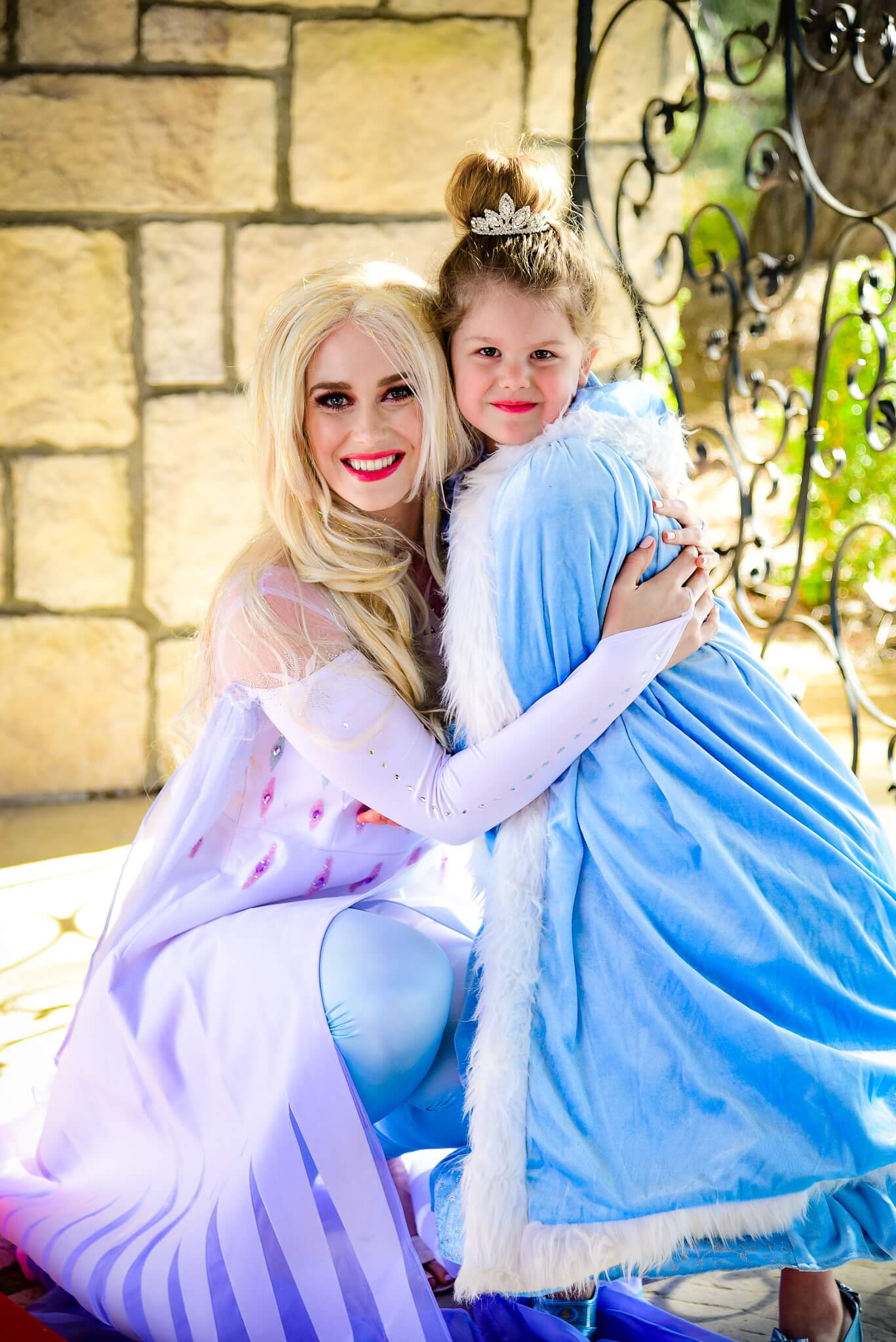 Elsa the Snow Queen with little girl